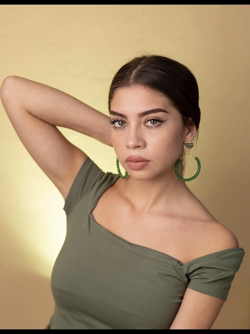 Olive Off-Shoulder Top with Green Hoop Earrings